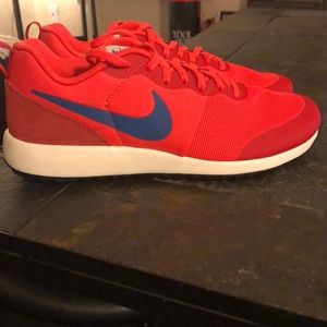 Red women’s Nike shoes